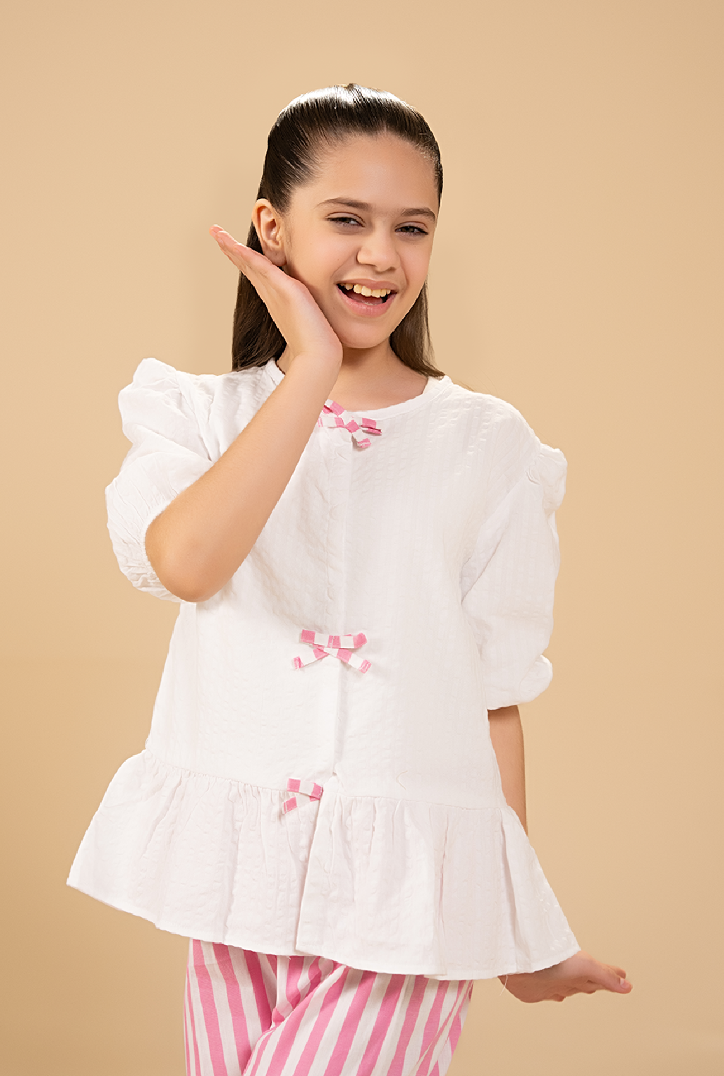 Stylish Peplum-Cut Top Paired With Striped Trousers