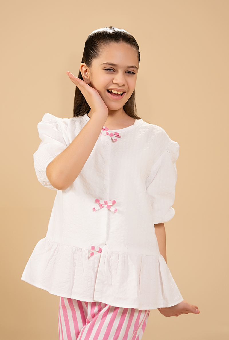 Stylish Peplum-Cut Top Paired With Striped Trousers